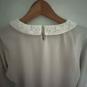 Garnet Hill size medium jersey knit lace collar long sleeve top.